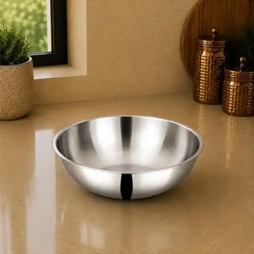 Stainless steel tasla for cooking sabji, preparing vegetables and everyday Indian kitchen use.