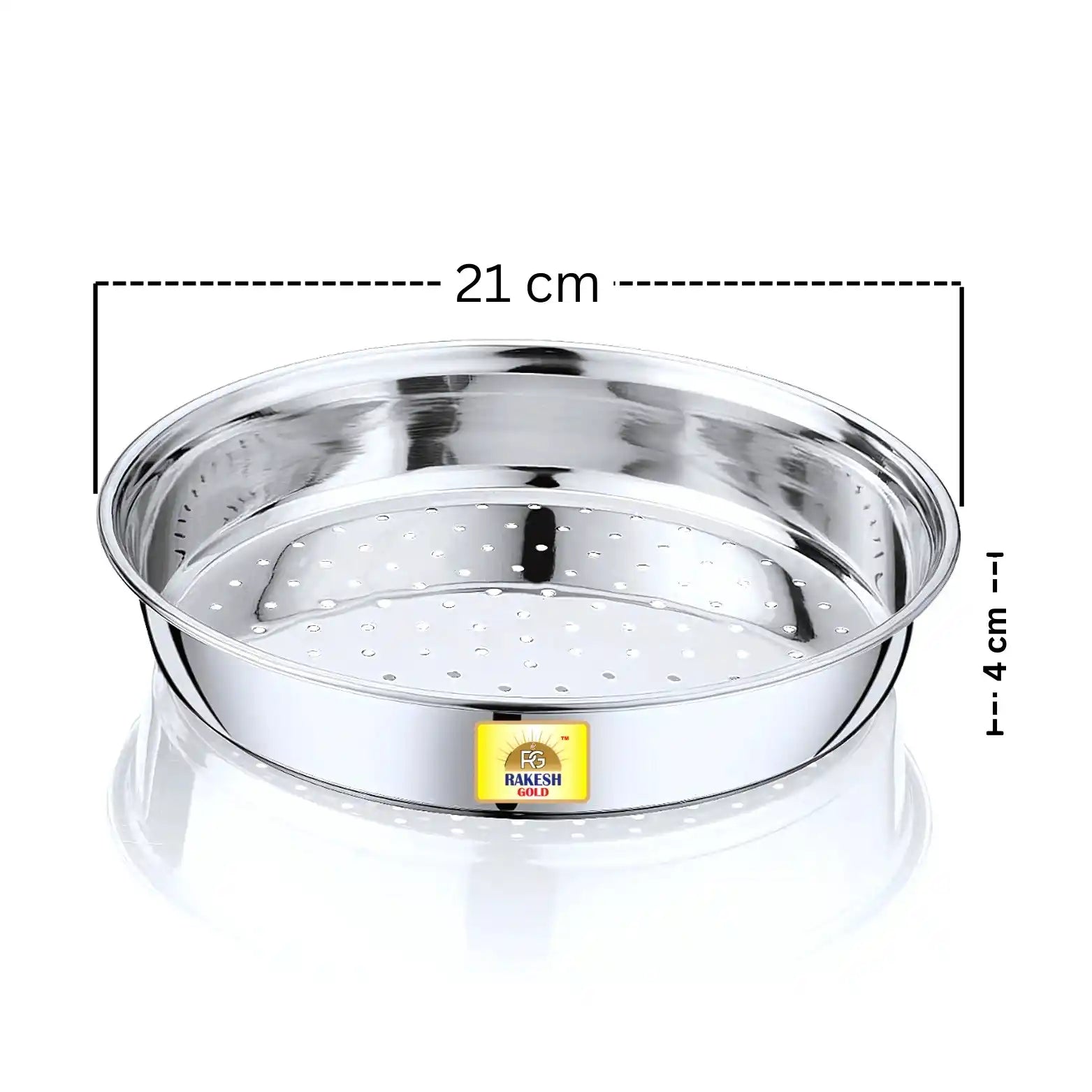 Stainless steel chalni (strainer) on a warm modern kitchen countertop with a window view, decorative plant, and copper storage jars.