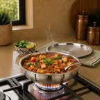 Stir-fry dish in a metal bowl on a gas stove with a kitchen setting.
