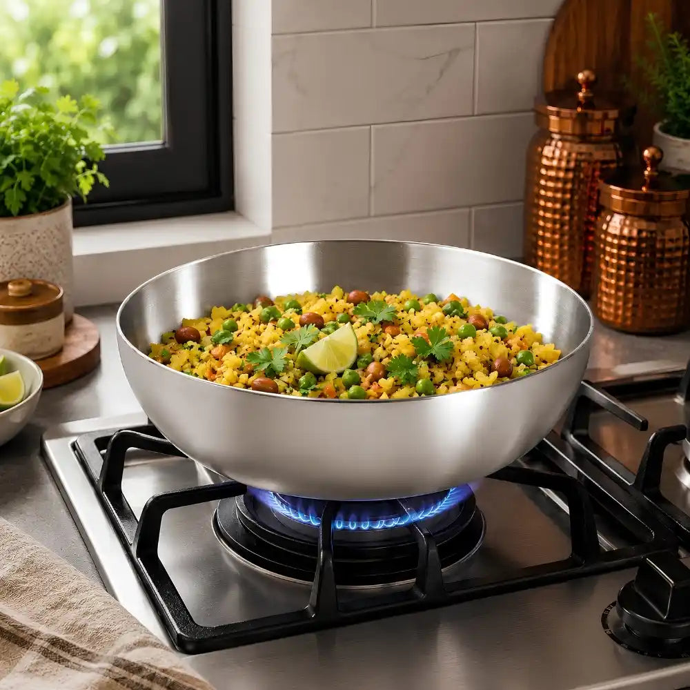 Stir-fry dish in a large metal bowl on a gas stove with a kitchen background