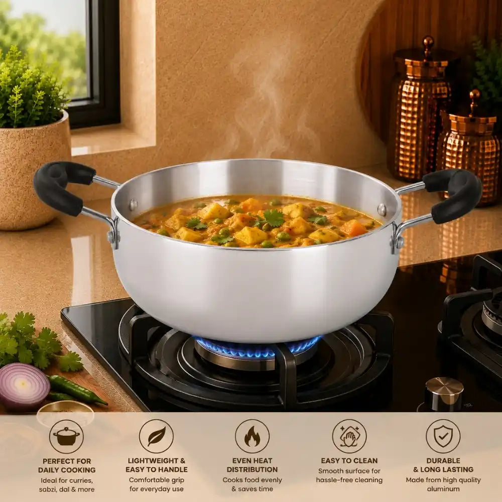 Stainless steel wok with food on a gas stove, surrounded by kitchen decor.