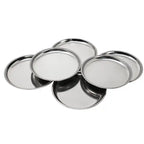 Set of five metallic trays on a white background