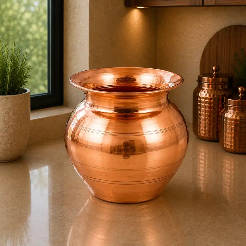 Copper vase on a reflective surface with a neutral background