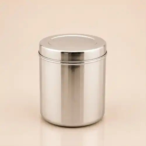 A shiny stainless steel cylindrical canister with a matching screw-on lid, shown on a plain beige background.