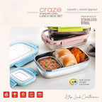 Craze stainless steel lunch box set with compartments filled with food on a white background