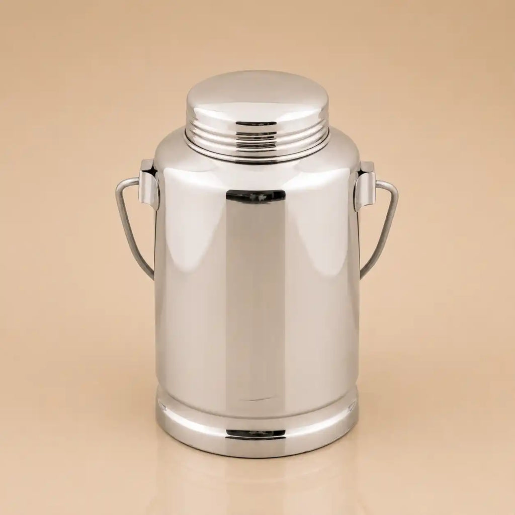 A polished stainless steel milk canister with a matching screw-top lid and two side handles, shown on a plain beige background.