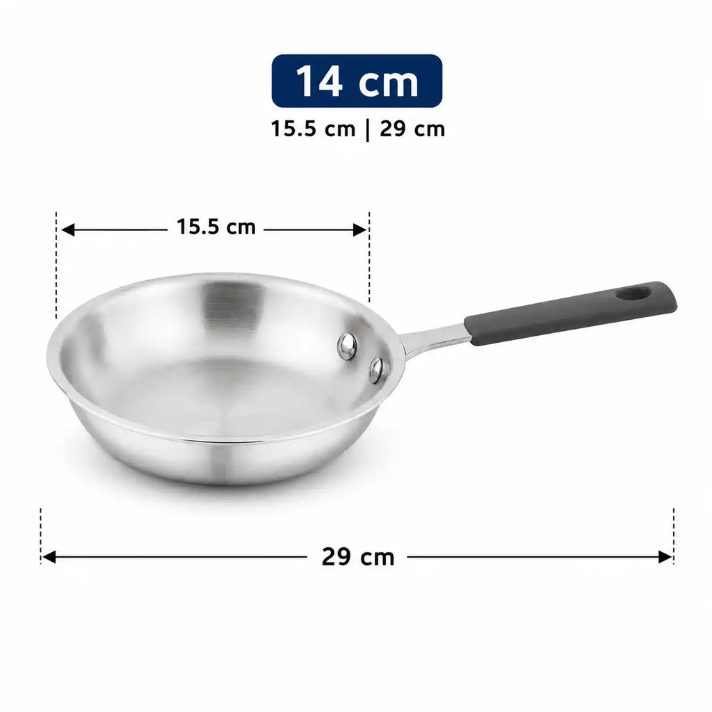 A stainless steel frying pan with a dark gray handle, shown with dimension lines and text indicating a 14 cm (15.5 cm x 29 cm) diameter.