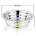 Stainless steel vegetable washing chalni with perforated design on a modern kitchen countertop, ideal for rinsing fruits, vegetables, rice, and pasta.