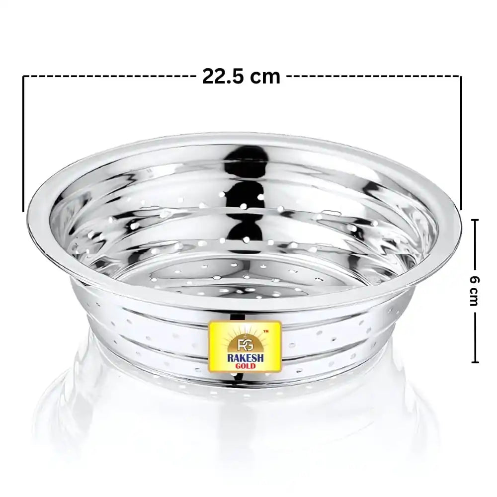 Stainless steel vegetable washing chalni with perforated design on a modern kitchen countertop, ideal for rinsing fruits, vegetables, rice, and pasta.