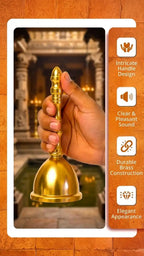 Hand holding a gold bell with temple background