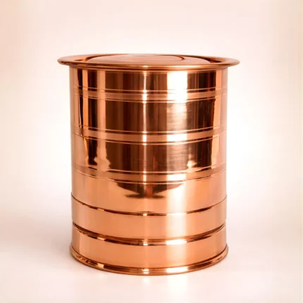 Polished copper water storage container with lid isolated on light background