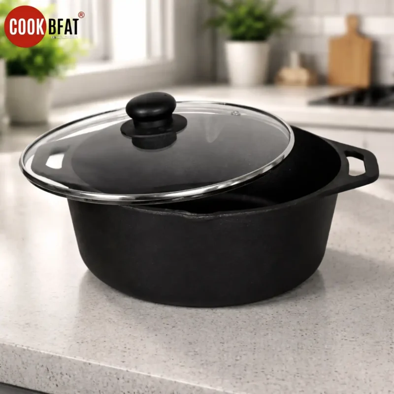 Premium cast iron Dutch oven with glass lid on modern kitchen countertop