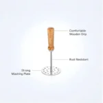Stainless steel potato masher with wooden handle in kitchen