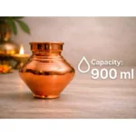 Pure copper kalash for pooja with polished finish placed on wooden surface