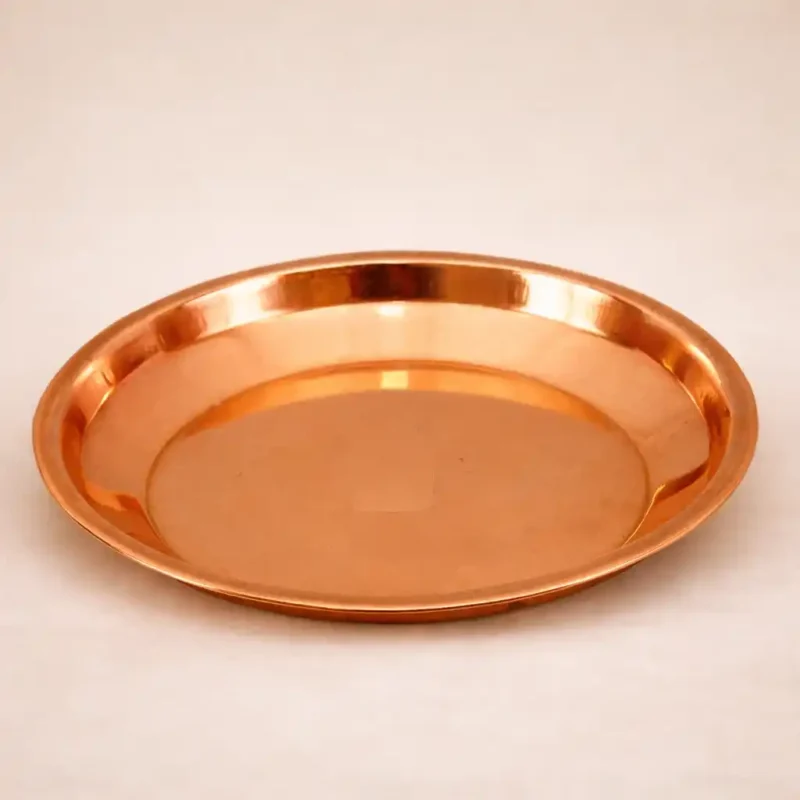 Pure copper pooja thali plate with polished finish for aarti and पूजा rituals